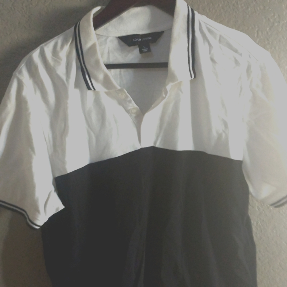 Large color block in Black and White with black trim accent on collar.